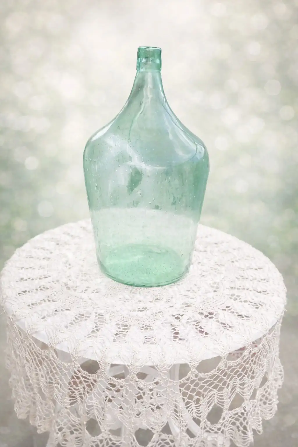 2 large vintage green glass demijohn bottles